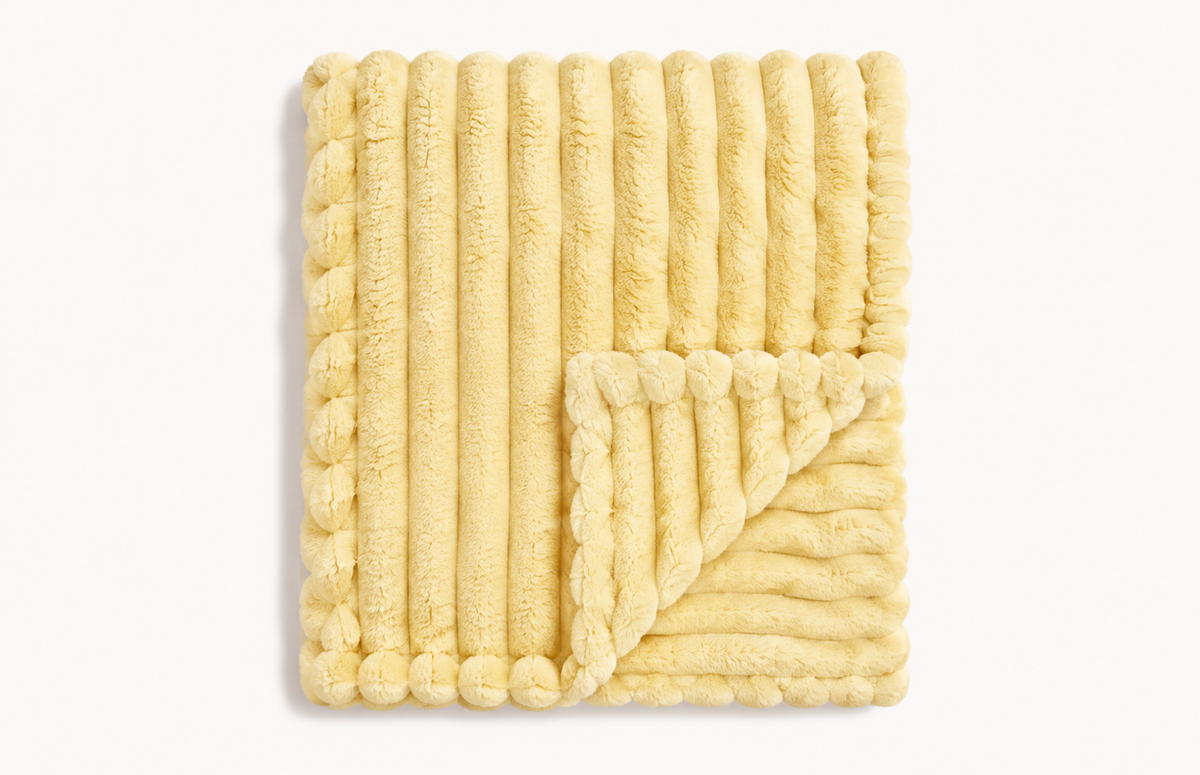 The Cloud Rib in Butter, folded
