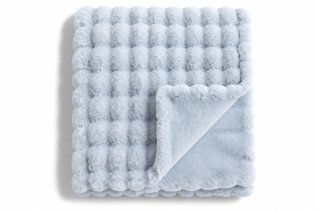 The Cloud Quilt in Icy Blue, folded