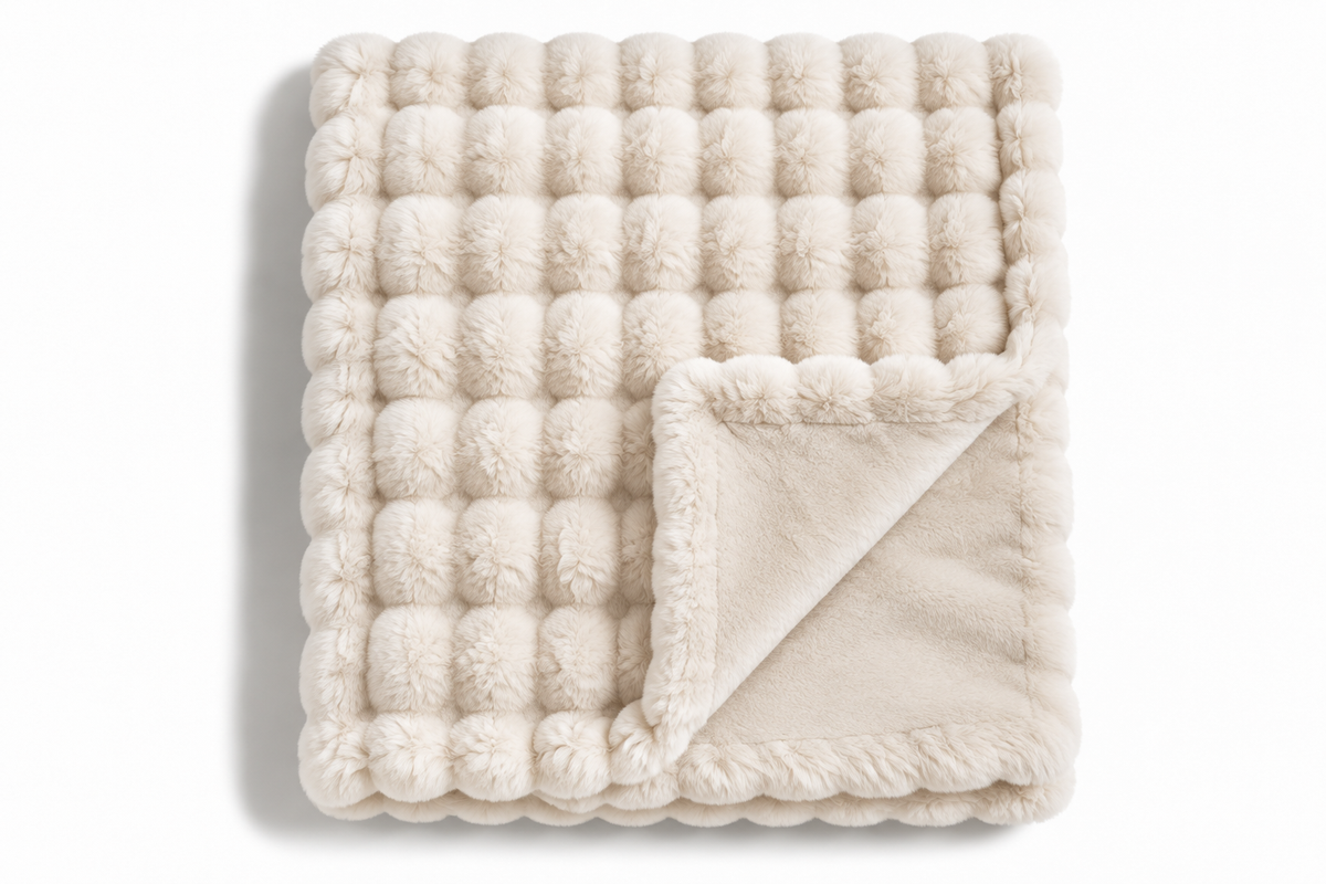 The Cloud Quilt in Ivory, folded