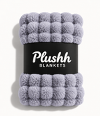 The Cloud Quilt in Lavender, rolled