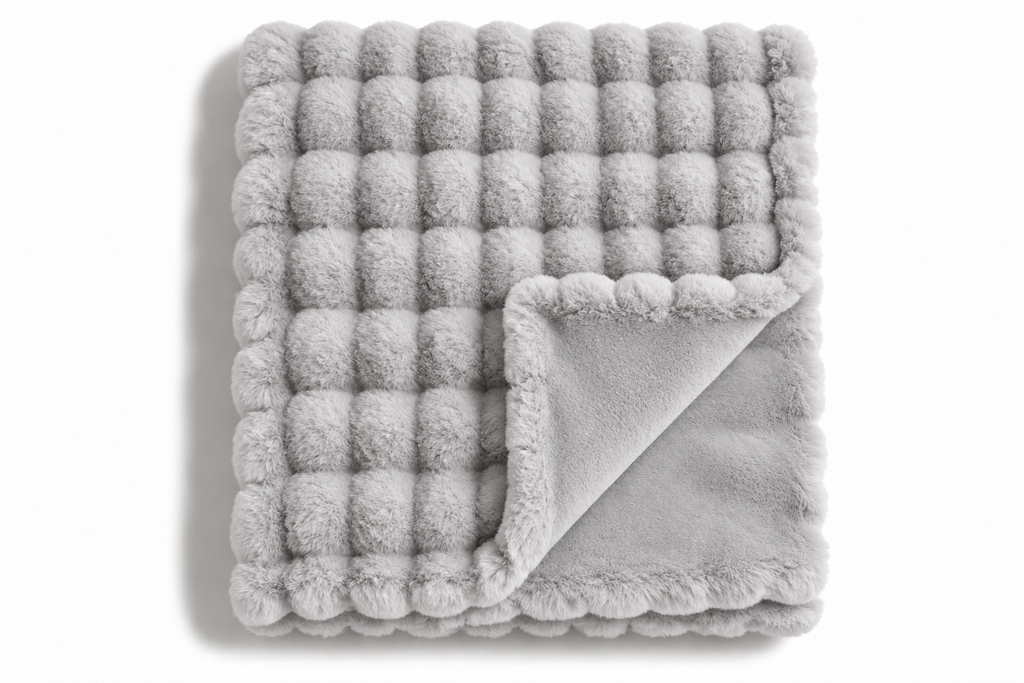 The Cloud Quilt in Silver Grey, folded