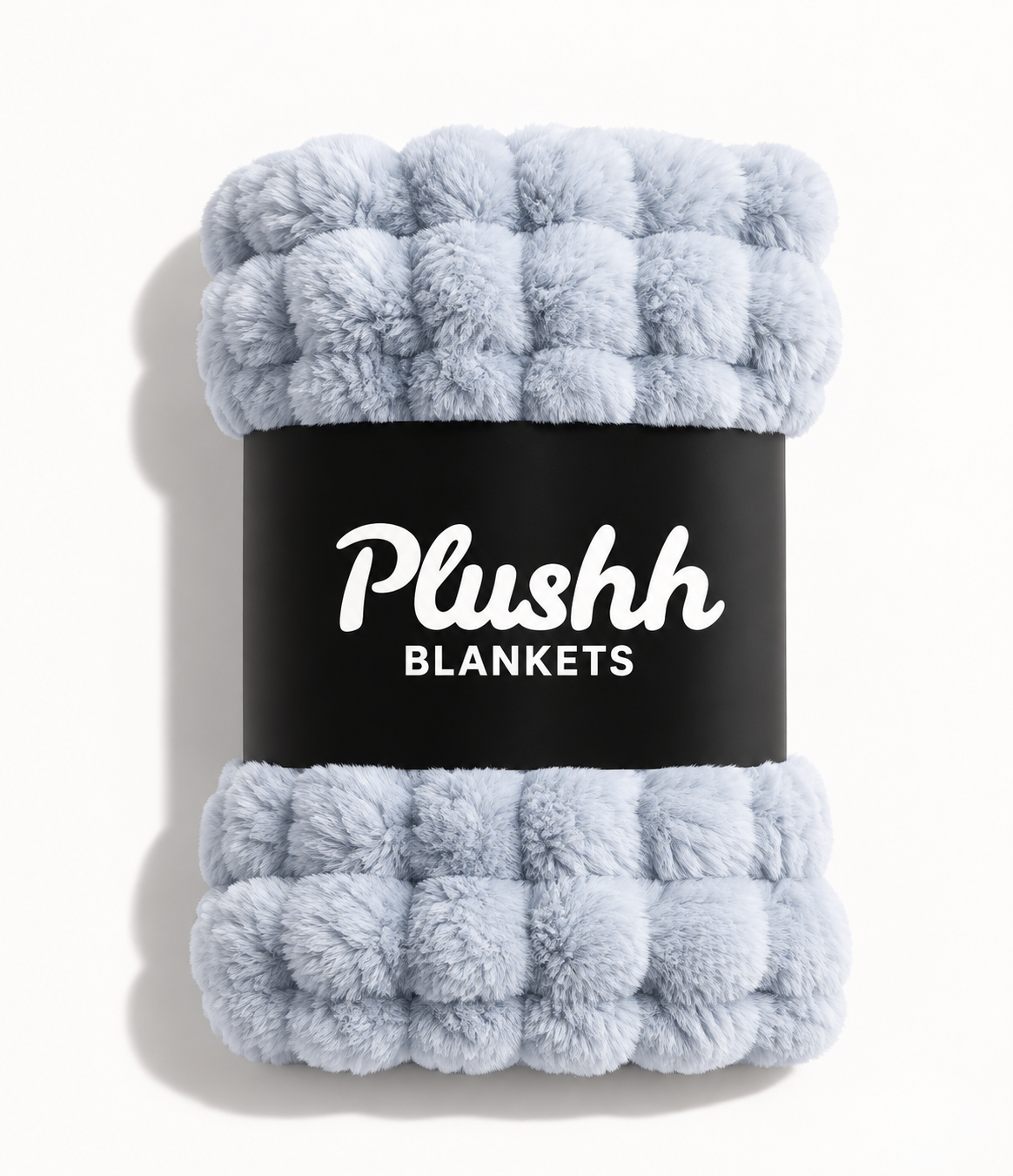 The Cloud Quilt in Icy Blue, rolled