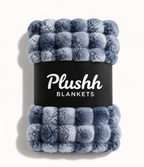 The Cloud Quilt in Dusty Blue, rolled