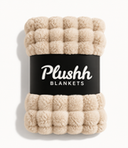 The Cloud Quilt in Cream, rolled
