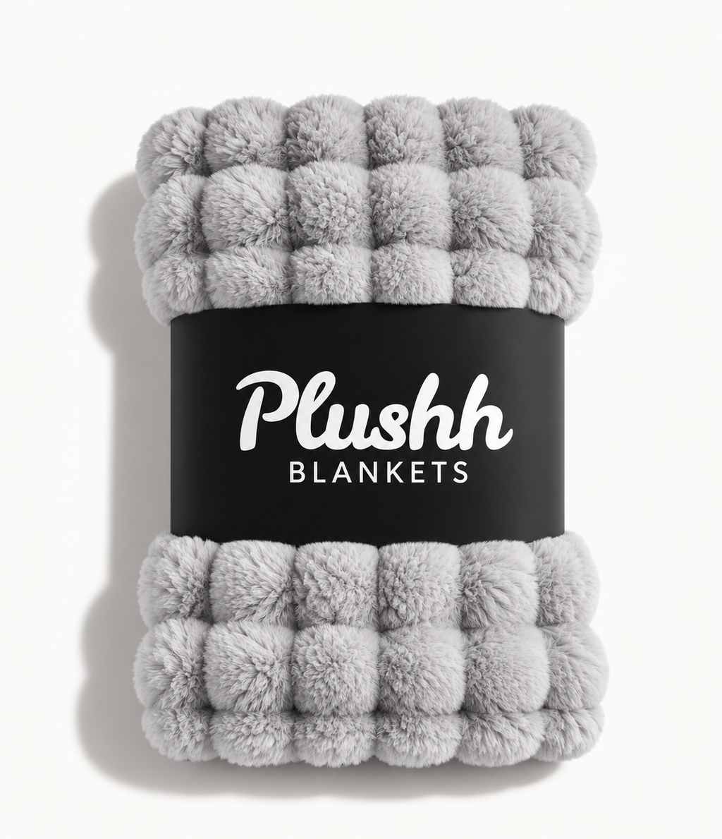 The Cloud Quilt in Silver Grey, rolled