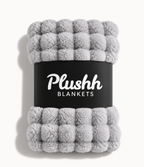 The Cloud Quilt in Silver Grey, rolled